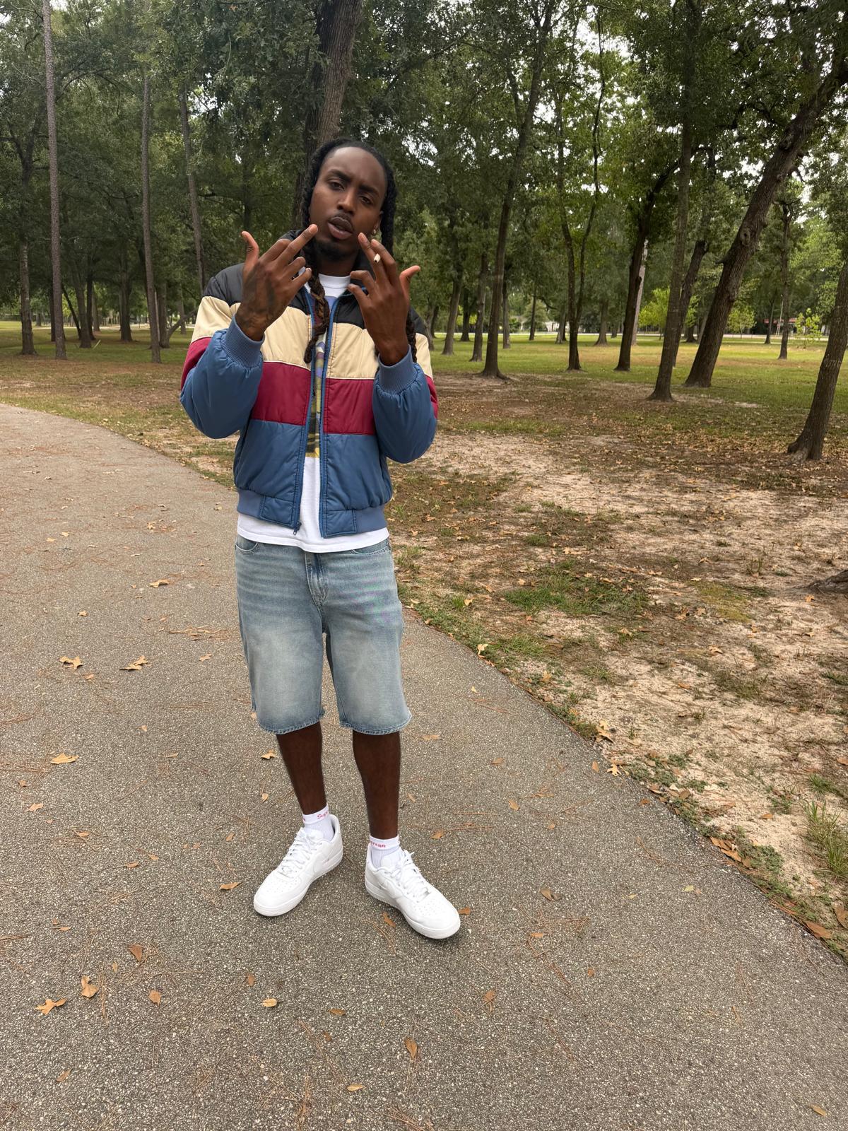 FMR Trill gesturing outdoors on park path